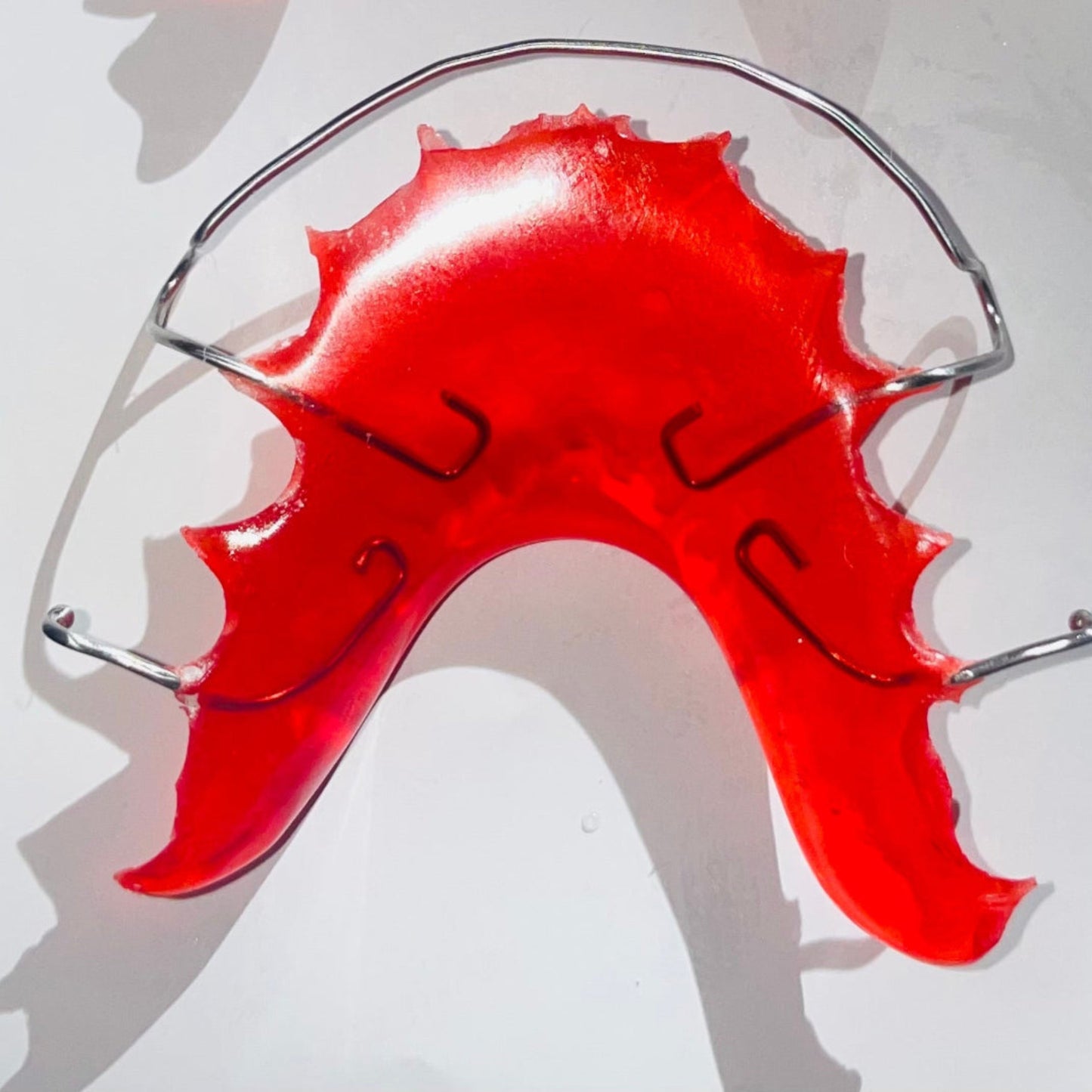 Red custom retainer for retaining