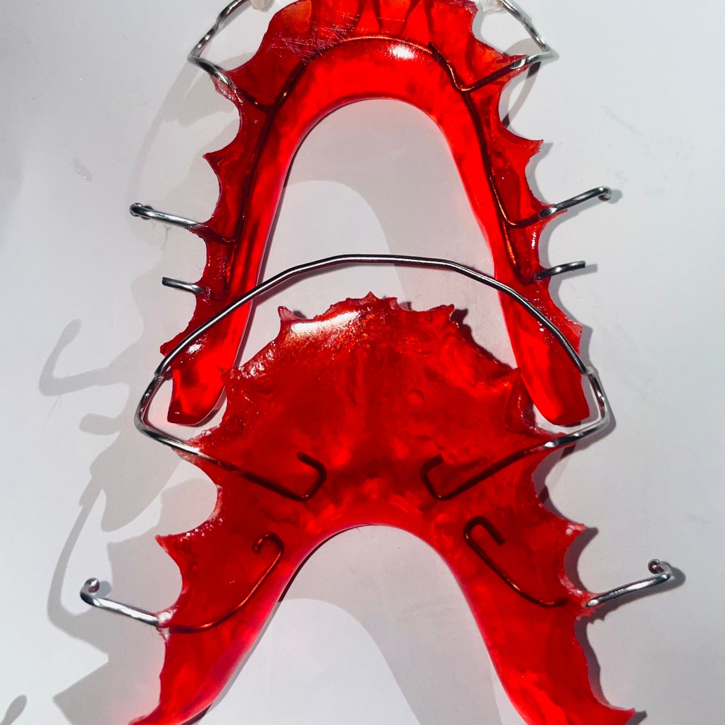 Durable dental wire with shiny red acrylic