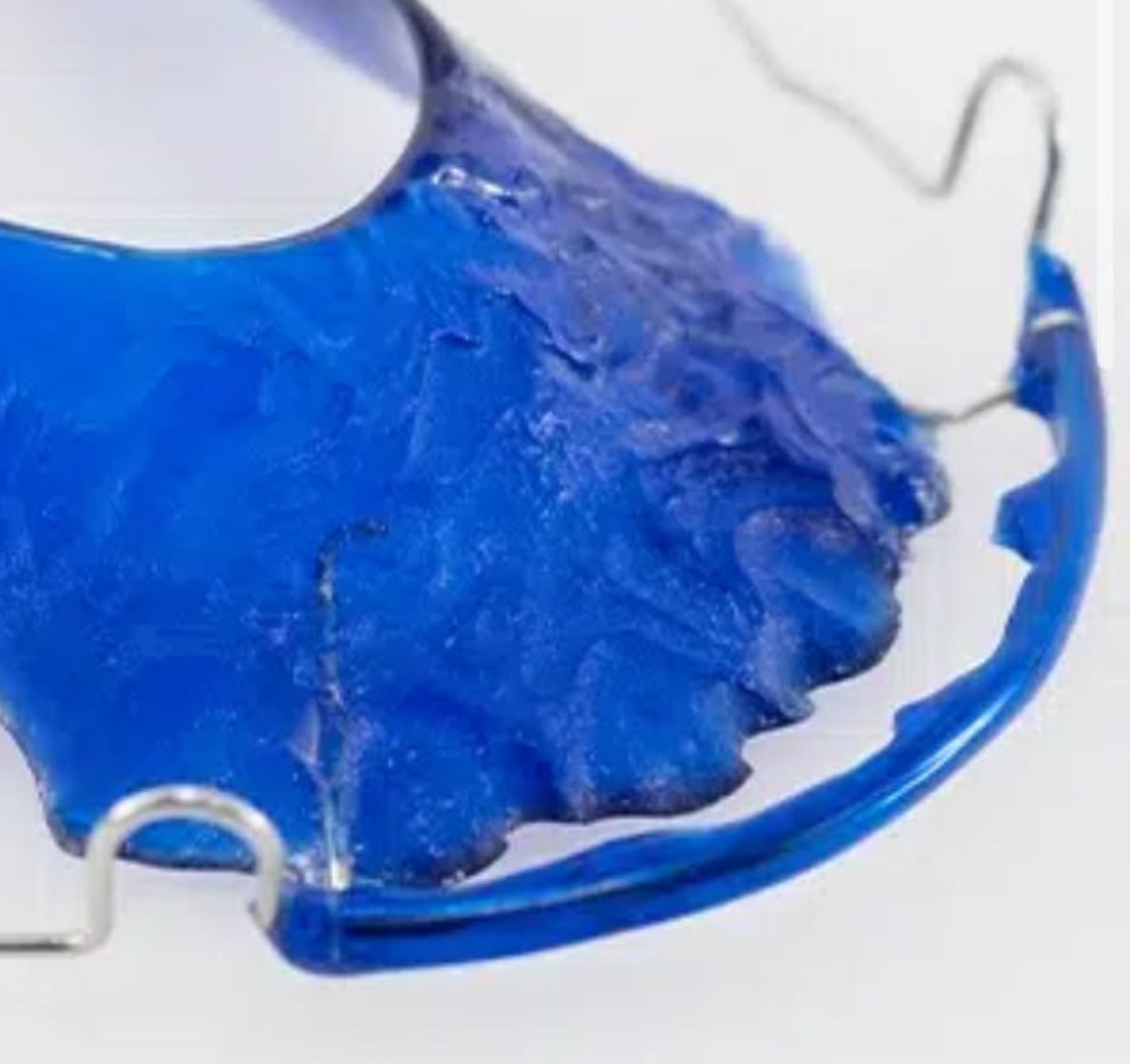 Hawley retainer with blue wire 