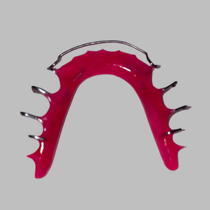 Lower Hot pink Hawley Retainer. Hawley retainer is used to retain teeth. 